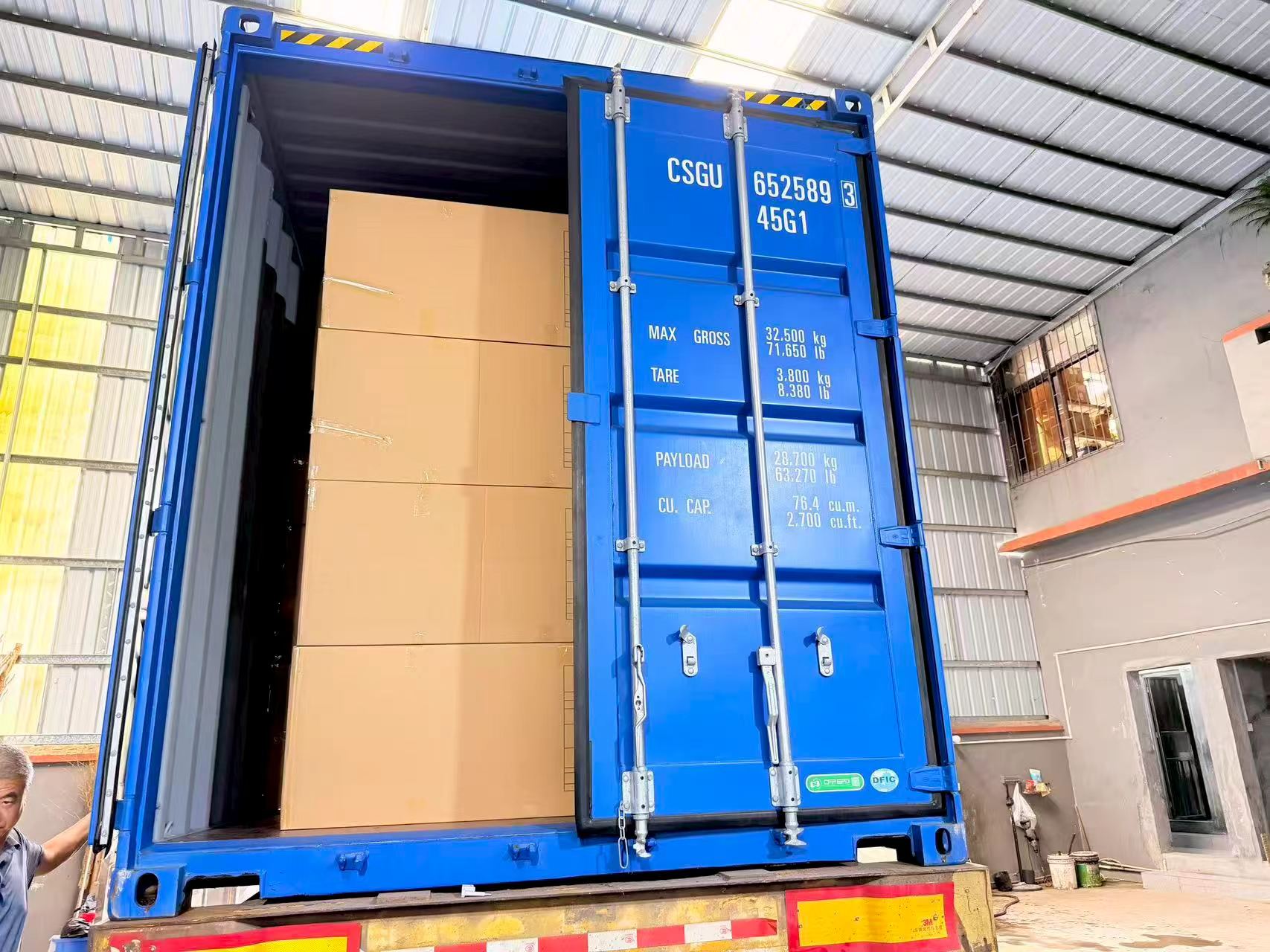 Packed cartons inside an export shipping container